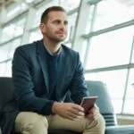 E-book 2 airport passport and business man for travel opportunity immigration and relax in lobby waiting r